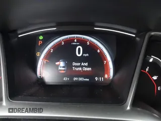 2019 Honda Civic Sport with VIN 19XFC2F81KE034047, listed as a IAAI auction lot 41995614 with 91,303 mi miles and . Bid and sale history available at DreamBid. Image 7.