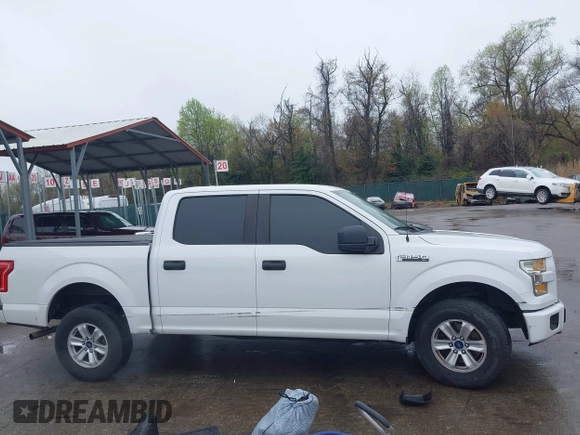 2015 Ford F-150 XLT with VIN 1FTEW1E80FFB30827, listed as a IAAI auction lot 41961072 with 155,206 mi miles and . Bid and sale history available at DreamBid. Image 13.