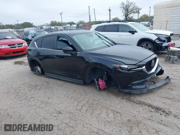 2019 Mazda CX-5 Touring with VIN JM3KFACM0K0692007, listed as a IAAI auction lot 41645657 with 1 mi miles. Bid and sale history available at carsss.com. Image 1.