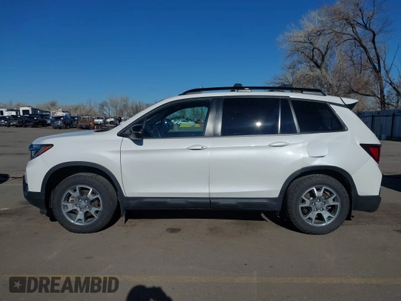 2023 Honda Passport TrailSport with VIN 5FNYF8H60PB015912, listed as a IAAI auction lot 41667749 with 35,019 mi miles and . Bid and sale history available at carsss.com. Image 15.