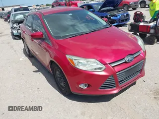 2012 Ford Focus SE z VIN 1FAHP3F29CL428814, wystawiony jako IAAI lot #42814205 z przebiegiem 227 986 mil mil oraz . Historia ofert i sprzedaży dostępna na DreamBid. Obrazek 1.