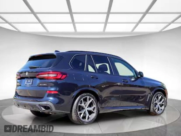2021 BMW X5 xDrive45e with VIN 5UXTA6C04M9H41005, listed as a Copart auction lot 57778635 with 20,683 mi miles and Clean title. Bid and sale history available at DreamBid. Image 4.