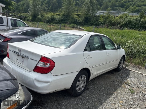 2003 Toyota Camry LE with VIN 4T1BE32K43U207204, listed as a Copart auction lot 57167845 with 189,656 mi miles and Clean Title. Bid and sale history available at DreamBid. Image 4.
