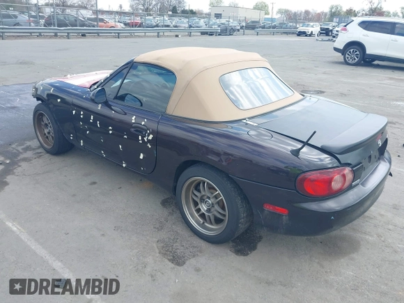 2004 Mazda MX-5 Miata LS with VIN JM1NB353040409951, listed as a IAAI auction lot 41848965 with 125,750 mi miles and . Bid and sale history available at DreamBid. Image 3.