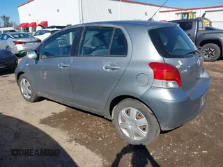 2010 Toyota Yaris with VIN JTDKT4K38A5285260, listed as a IAAI auction lot 41476373 with 104,358 mi miles. Bid and sale history available at carsss.com. Image 3.
