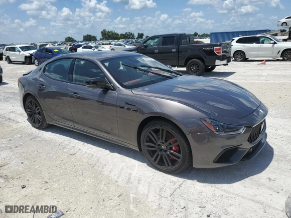 2023 Maserati Ghibli Modena with VIN ZAM57YSM8PX428749, listed as a Copart auction lot 64567564 with 0 mi miles and Salvage Title. Bid and sale history available at carsss.com. Image 4.