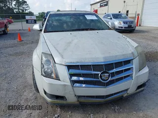 2009 Cadillac CTS RWD with VIN 1G6DF577690108865, listed as a IAAI auction lot 42314121 with 153,702 mi miles and . Bid and sale history available at DreamBid. Image 6.