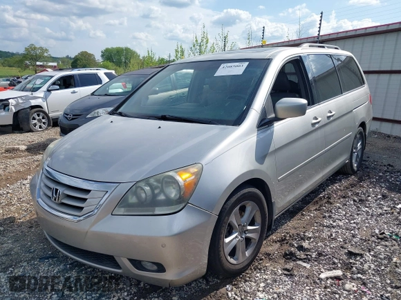2009 Honda Odyssey Touring z VIN 5FNRL38999B052244, wystawiony jako IAAI lot #42085003 z przebiegiem 269 402 mil mil oraz . Historia ofert i sprzedaży dostępna na DreamBid. Obrazek 2.