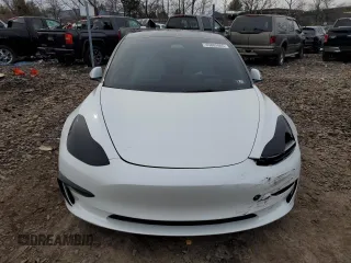 2022 Tesla Model 3 Long Range with VIN 5YJ3E1EB4NF164276, listed as a Copart auction lot 45802865 with 56,836 mi miles and Salvage Title. Bid and sale history available at DreamBid. Image 5.