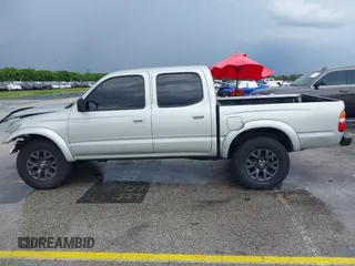 2003 Toyota Tacoma PreRunner z VIN 5TEGN92N13Z295384, wystawiony jako IAAI lot #42406105 z przebiegiem 194 171 mil mil oraz . Historia ofert i sprzedaży dostępna na DreamBid. Obrazek 14.