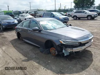2018 Honda Accord Touring with VIN 1HGCV2F94JA019664, listed as a IAAI auction lot 42716690 with 63,984 mi miles and . Bid and sale history available at DreamBid. Image 1.