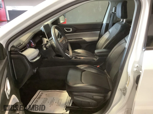 2022 Jeep Compass Latitude with VIN 3C4NJDBB6NT143179, listed as a IAAI auction lot 42748522 with 39,675 mi miles and . Bid and sale history available at DreamBid. Image 22.