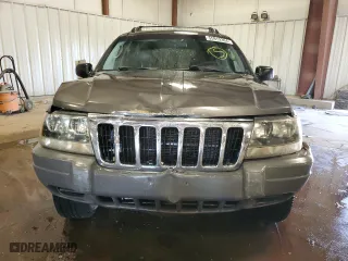 2002 Jeep Grand Cherokee Laredo with VIN 1J4GW48N52C240077, listed as a Copart auction lot 55919394 with 223,991 mi miles and Clean Title. Bid and sale history available at carsss.com. Image 5.