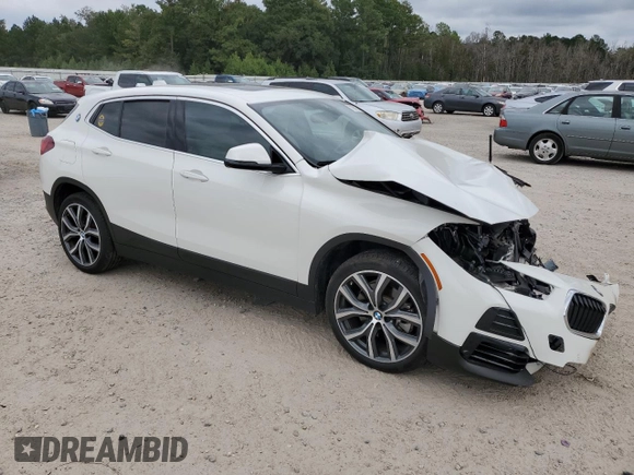 2022 BMW X2 sDrive28i with VIN WBXYH9C0XN5T46405, listed as a Copart auction lot 70291554 with 28,035 mi miles and Salvage Title. Bid and sale history available at carsss.com. Image 4.