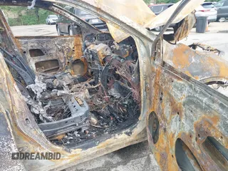 2018 Toyota Highlander Hybrid XLE z VIN 5TDJGRFH3JS037513, wystawiony jako IAAI lot #39489178 z przebiegiem Nie podano mil oraz . Historia ofert i sprzedaży dostępna na DreamBid. Obrazek 5.