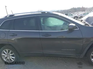 2016 Jeep Cherokee Limited z VIN 1C4PJLDB1GW272654, wystawiony jako IAAI lot #41793549 z przebiegiem Nie podano mil oraz . Historia ofert i sprzedaży dostępna na DreamBid. Obrazek 13.