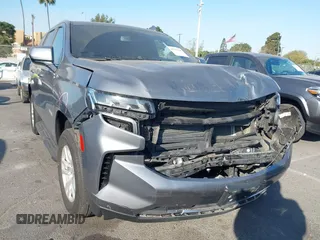 2021 Chevrolet Tahoe LT z VIN 1GNSKNKD1MR371418, wystawiony jako IAAI lot #41312178 z przebiegiem 94 020 mil mil oraz . Historia ofert i sprzedaży dostępna na DreamBid. Obrazek 1.