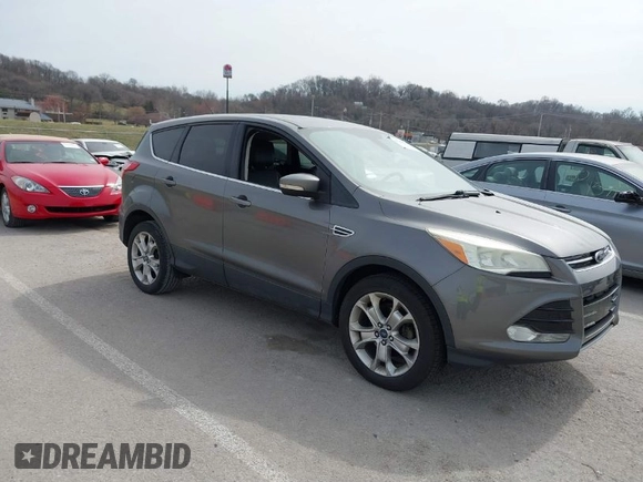 2013 Ford Escape SEL with VIN 1FMCU0HX5DUB82534, listed as a IAAI auction lot 41769014 with 182,433 mi miles. Bid and sale history available at carsss.com. Image 1.