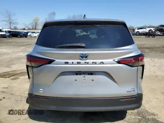 2021 Toyota Sienna LE z VIN 5TDKRKEC3MS023188, wystawiony jako Copart lot #51326975 z przebiegiem Nie podano mil oraz Szkody całkowita. Historia ofert i sprzedaży dostępna na DreamBid. Obrazek 6.