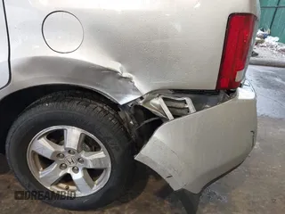 2011 Honda Pilot EX-L with VIN 5FNYF4H56BB057039, listed as a IAAI auction lot 41946647 with 187,783 mi miles. Bid and sale history available at carsss.com. Image 6.
