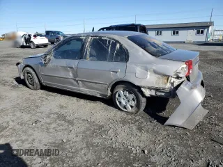 2002 Honda Civic EX with VIN 1HGES25712L014218, listed as a Copart auction lot 52325265 with 206,919 mi miles and Salvage Title. Bid and sale history available at DreamBid. Image 2.