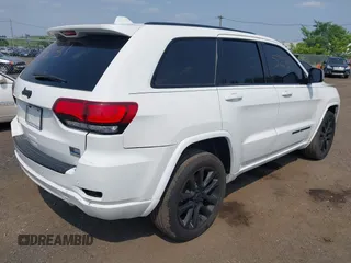 2020 Jeep Grand Cherokee Laredo E with VIN 1C4RJFAG5LC375033, listed as a IAAI auction lot 42415231 with 62,489 mi miles and . Bid and sale history available at DreamBid. Image 4.