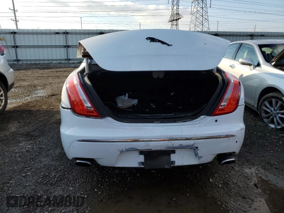 2013 Jaguar XJ with VIN SAJWJ1CD6D8V50968, listed as a Copart auction lot 79880924 with 136,280 mi miles and Salvage Title. Bid and sale history available at carsss.com. Image 6.
