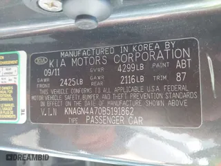 2011 Kia Optima EX with VIN KNAGN4A70B5191862, listed as a IAAI auction lot 41971997 with 146,392 mi miles. Bid and sale history available at carsss.com. Image 9.