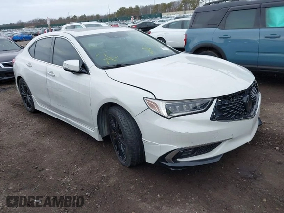 2019 Acura TLX w/Advance Pkg with VIN 19UUB3F84KA003847, listed as a IAAI auction lot 41735006 with 999,999 mi miles. Bid and sale history available at carsss.com. Image 1.