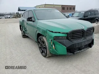 2024 BMW XM z VIN 5YM23CS05R9V07202, wystawiony jako Copart lot #42382675 z przebiegiem 10 028 mil mil oraz Szkody całkowita. Historia ofert i sprzedaży dostępna na DreamBid. Obrazek 10.