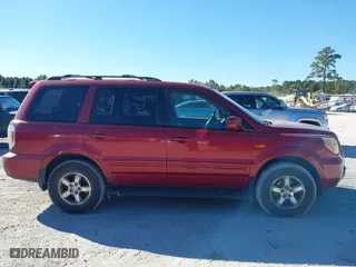 2006 Honda Pilot EX-L with VIN 5FNYF18566B022909, listed as a IAAI auction lot 40576412 with 310,278 mi miles. Bid and sale history available at carsss.com. Image 13.
