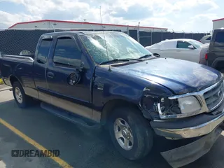 2002 Ford F-150 XL with VIN 1FTRX17L92NA56050, listed as a IAAI auction lot 41992155 with 1 mi miles. Bid and sale history available at carsss.com. Image 1.