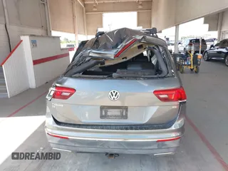 2018 Volkswagen Tiguan SEL with VIN 3VV3B7AXXJM213579, listed as a IAAI auction lot 42664339 with 84,676 mi miles and . Bid and sale history available at DreamBid. Image 16.