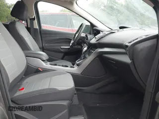 2014 Ford Escape SE z VIN 1FMCU0G98EUC21234, wystawiony jako IAAI lot #42338783 z przebiegiem 124 178 mil mil oraz . Historia ofert i sprzedaży dostępna na DreamBid. Obrazek 5.