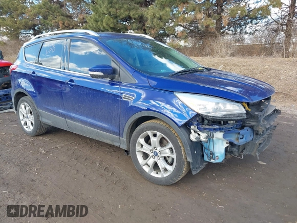 2016 Ford Escape Titanium with VIN 1FMCU9JX5GUA96563, listed as a IAAI auction lot 41695524 with 76,992 mi miles. Bid and sale history available at carsss.com. Image 1.