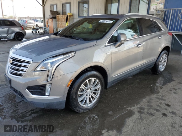 2019 Cadillac XT5 Luxury FWD z VIN 1GYKNCRS4KZ221304, wystawiony jako Copart lot #54995415 z przebiegiem 128 940 mil mil oraz Szkoda całkowita • Salvage title. Historia ofert i sprzedaży dostępna na DreamBid. Obrazek 1.