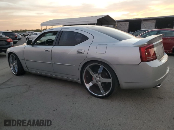2006 Dodge Charger SRT-8 with VIN 2B3KA73W26H279925, listed as a Copart auction lot 78479574 with 127,443 mi miles and Salvage Title. Bid and sale history available at DreamBid. Image 2.