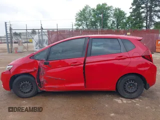 2017 Honda Fit LX z VIN 3HGGK5H58HM705063, wystawiony jako IAAI lot #41962906 z przebiegiem 163 835 mil mil oraz . Historia ofert i sprzedaży dostępna na DreamBid. Obrazek 14.