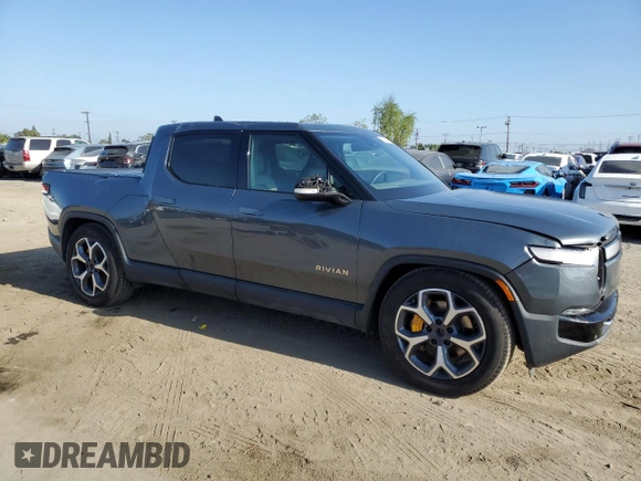 2022 Rivian R1T Adventure z VIN 7FCTGAAA9NN008771, wystawiony jako Copart lot #56243835 z przebiegiem 31 006 mil mil oraz Szkody całkowita. Historia ofert i sprzedaży dostępna na DreamBid. Obrazek 4.