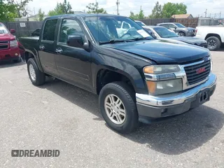2011 GMC Canyon SLE1 z VIN 1GTH6MFE8B8112755, wystawiony jako IAAI lot #42359366 z przebiegiem 153 905 mil mil oraz . Historia ofert i sprzedaży dostępna na DreamBid. Obrazek 1.
