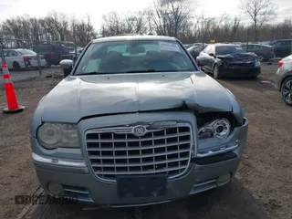 2006 Chrysler 300 C with VIN 2C3LK63H56H423161, listed as a IAAI auction lot 41947286 with 227,092 mi miles and . Bid and sale history available at carsss.com. Image 12.