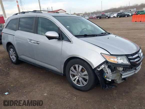 2014 Honda Odyssey EX-L with VIN 5FNRL5H65EB096544, listed as a IAAI auction lot 41903451 with 99,628 mi miles and . Bid and sale history available at carsss.com. Image 1.