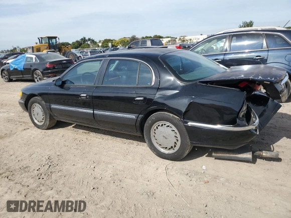 1998 Lincoln Continental with VIN 1LNFM97V8WY742639, listed as a Copart auction lot 82138303 with 268,814 mi miles and Salvage Title. Bid and sale history available at carsss.com. Image 2.