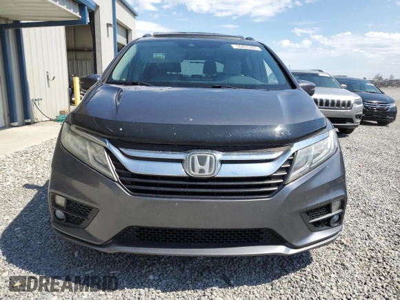 2018 Honda Odyssey EX-L z VIN 5FNRL6H70JB000036, wystawiony jako Copart lot #50455365 z przebiegiem 141 010 mil mil oraz Szkoda całkowita • Salvage title. Historia ofert i sprzedaży dostępna na DreamBid. Obrazek 5.