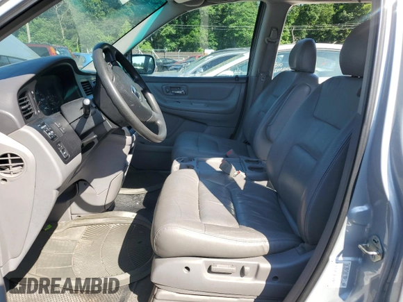 2003 Honda Odyssey EX-L z VIN 5FNRL18903B007639, wystawiony jako Copart lot #57230975 z przebiegiem 189 235 mil mil oraz Szkoda całkowita • Salvage title. Historia ofert i sprzedaży dostępna na DreamBid. Obrazek 7.