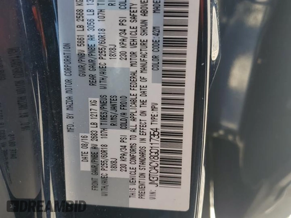 2016 Mazda CX-9 Touring z VIN JM3TCACY8G0117354, wystawiony jako Copart lot #56660935 z przebiegiem 112 365 mil mil oraz Szkoda całkowita • Salvage title. Historia ofert i sprzedaży dostępna na DreamBid. Obrazek 12.