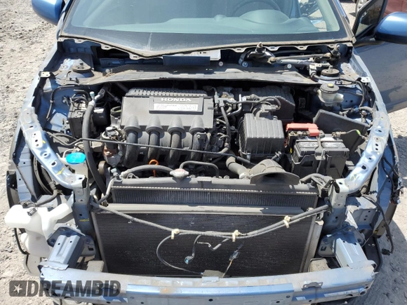 2010 Honda Insight LX z VIN JHMZE2H56AS008077, wystawiony jako Copart lot #60522045 z przebiegiem 105 936 mil mil oraz Szkoda całkowita • Salvage title. Historia ofert i sprzedaży dostępna na DreamBid. Obrazek 11.