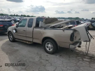 2002 Ford F-150 XL with VIN 1FTRX17L02KC02580, listed as a Copart auction lot 60859595 with 175,892 mi miles and Salvage title. Bid and sale history available at DreamBid. Image 2.
