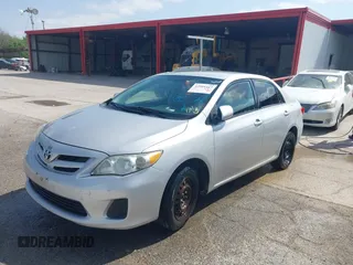 2012 Toyota Corolla L with VIN 2T1BU4EE1CC773885, listed as a IAAI auction lot 42004443 with 192,607 mi miles. Bid and sale history available at carsss.com. Image 17.