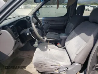 2000 Nissan Frontier XE with VIN 1N6ED27T5YC426456, listed as a Copart auction lot 54411425 with 117,600 mi miles and Salvage title. Bid and sale history available at DreamBid. Image 7.